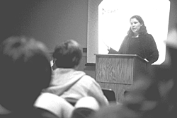 Photo of Emily Citkowski lecturing about East Timor