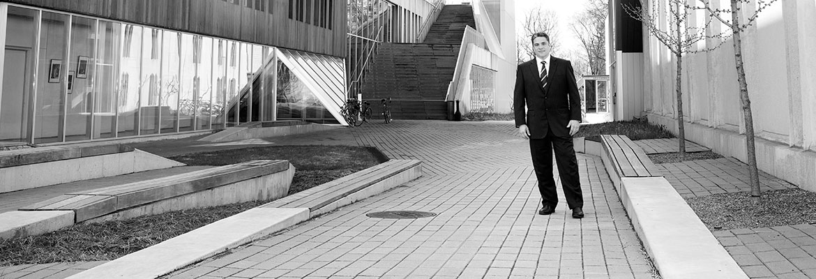 Dean David H. Stull '89 stands before the Kohl Building