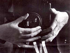 Hands photo with lens