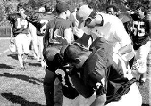 The Football Players support each other