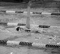 Disembodied hand and face doing backstroke