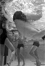 Swimmer goes underwater