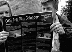 Students admiring the OFS Calender [sic]