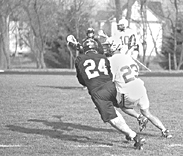 Image of lacrosse Yeoman pursuing the ball