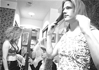 Photo of students preparing for Drag Ball