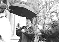 Photo of Professor of Politics Eve Sandberg talking with Cox protesters