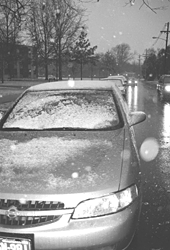 Photo of car covered in snow