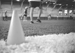 Photo of lacrosse practice on new astroturf