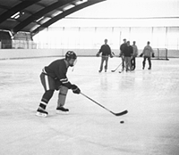 Photo of hockey team members practicing