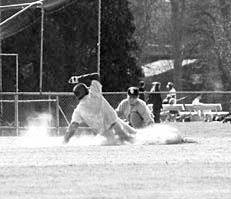 Picture of Ray Cagan sliding into third