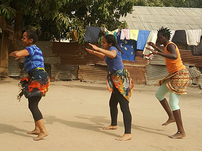 Photo of Dance Diaspora members in a village in Gambia